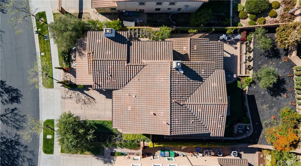 3 Adele Street Ladera Ranch, CA 92694 - Photo 40 of 42 a view of a patio with table and chairs with wooden fence and plants