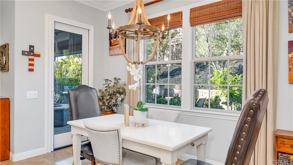 3 Adele Street Ladera Ranch, CA 92694 - Photo 10 of 42 a view of a dining room with furniture window and outside view