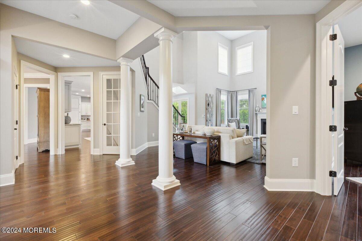 34 Windermere Road Lincroft, NJ 07738 - Photo 15 of 78 a living room with couches and a view of kitchen