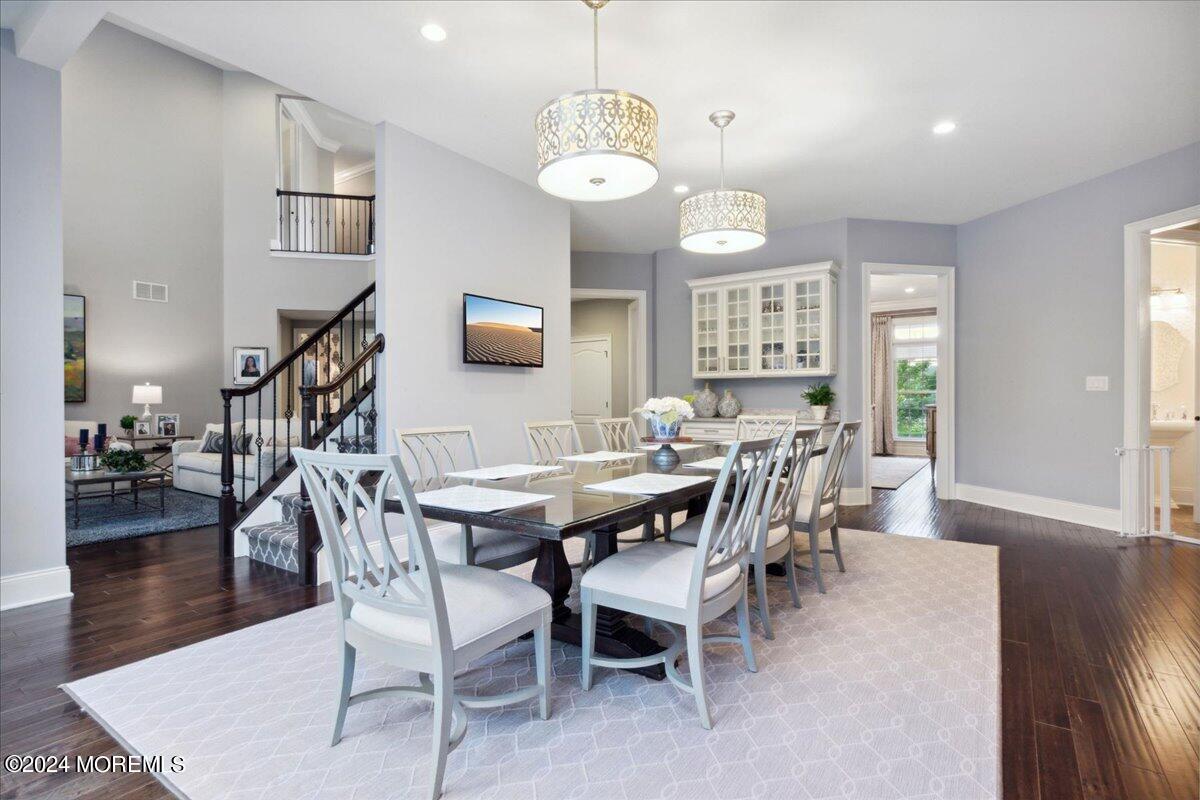 34 Windermere Road Lincroft, NJ 07738 - Photo 23 of 78 a view of a dining room with furniture window and wooden floor