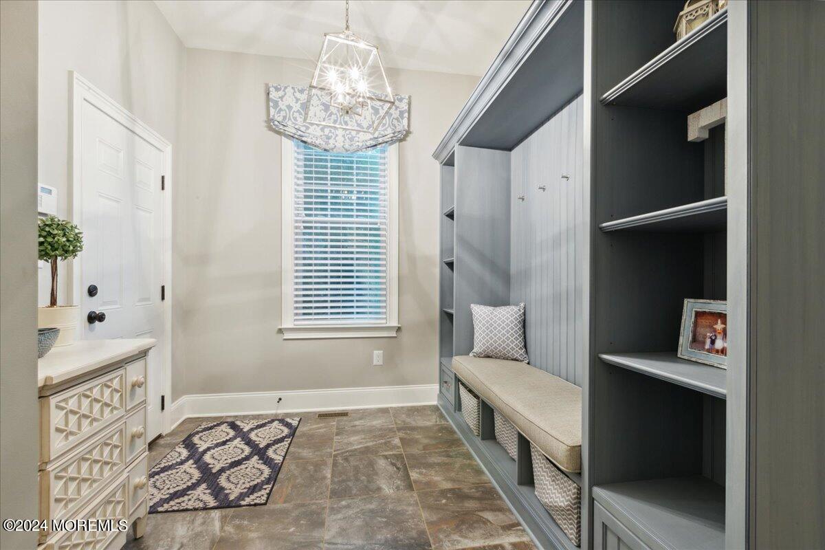 34 Windermere Road Lincroft, NJ 07738 - Photo 32 of 78 a spacious bathroom with a double vanity sink and a bathtub