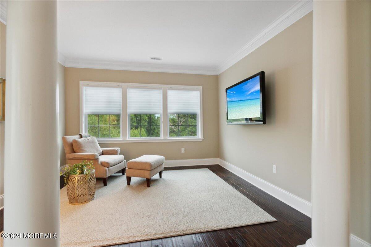 34 Windermere Road Lincroft, NJ 07738 - Photo 39 of 78 a living room with furniture and a flat screen tv