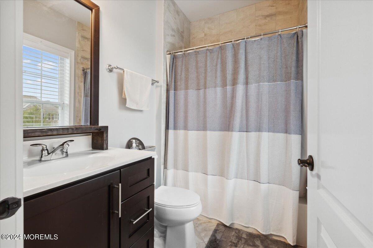 34 Windermere Road Lincroft, NJ 07738 - Photo 45 of 78 a bathroom with a sink toilet and shower