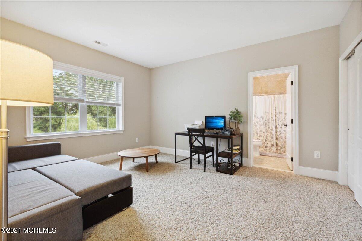 34 Windermere Road Lincroft, NJ 07738 - Photo 48 of 78 a living room with furniture and a window