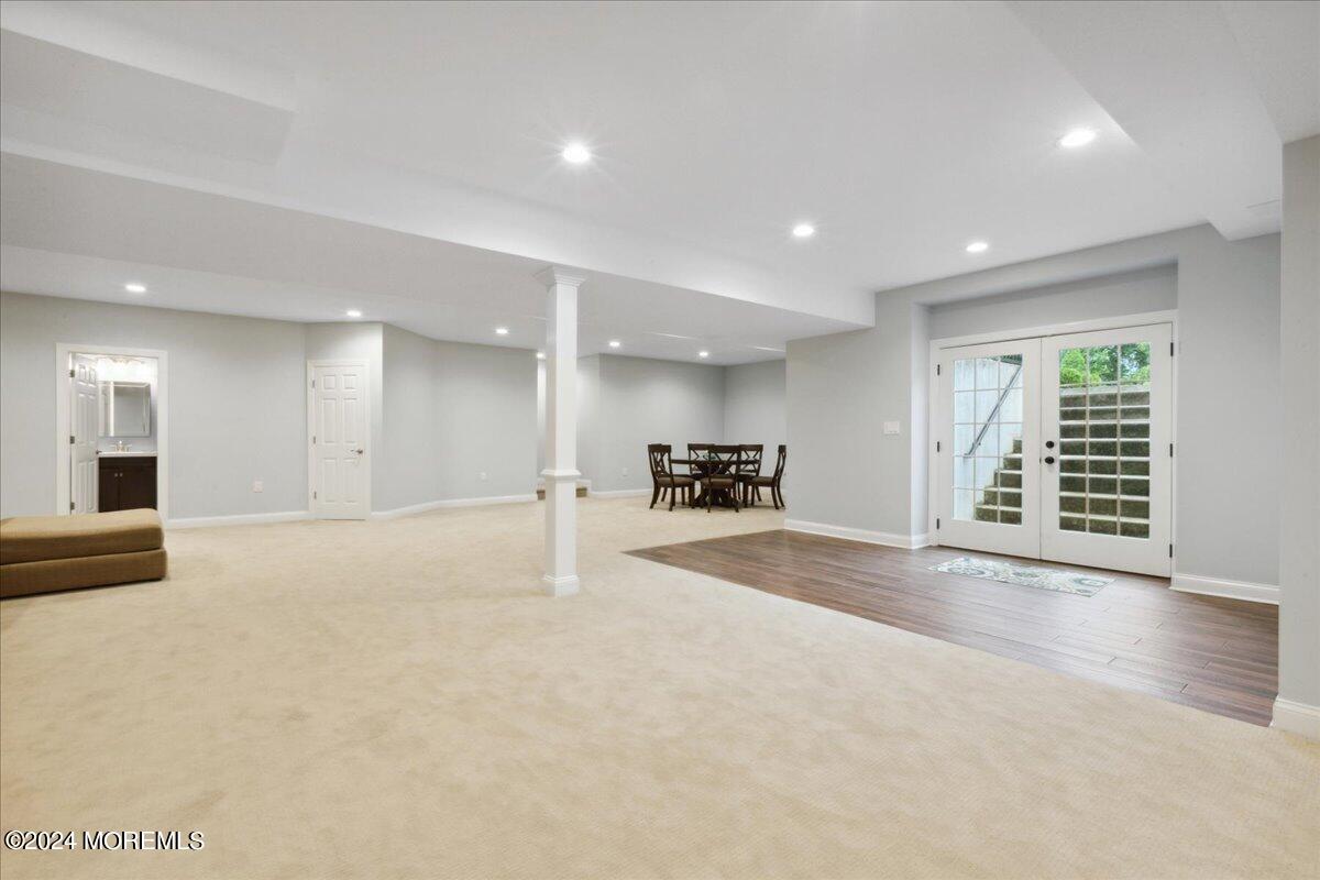 34 Windermere Road Lincroft, NJ 07738 - Photo 54 of 78 a view of an empty room with furniture and a window