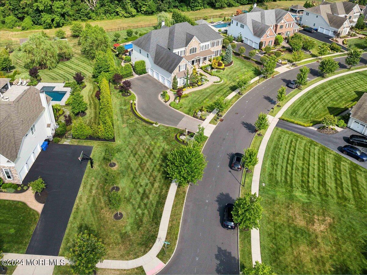 34 Windermere Road Lincroft, NJ 07738 - Photo 68 of 78 an aerial view of a residential houses with outdoor space