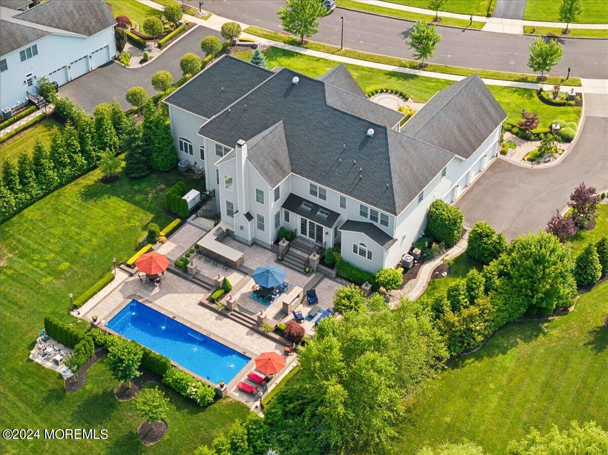 34 Windermere Road Lincroft, NJ 07738 - Photo 70 of 78 an aerial view of residential house with outdoor space and swimming pool
