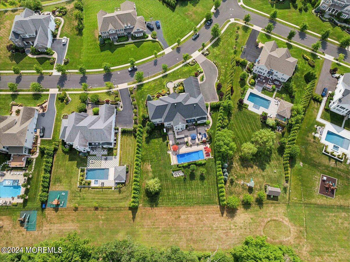 34 Windermere Road Lincroft, NJ 07738 - Photo 72 of 78 an aerial view of houses with yard