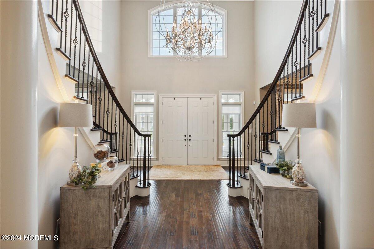 34 Windermere Road Lincroft, NJ 07738 - Photo 8 of 78 a view of entryway and hall with wooden floor