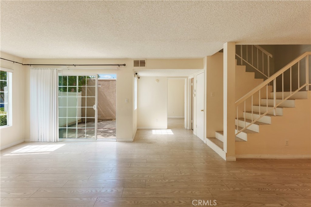 19111 Hamlin Street Reseda, CA 91335 - Photo 7 of 20 Living room/dining room view as you enter
