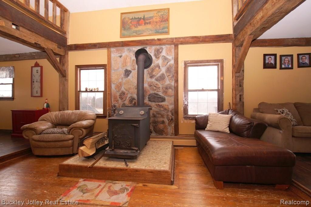 3215 Argentine Road Howell, MI 48855 - Photo 11 of 22 Cozy Wood Burning Stove