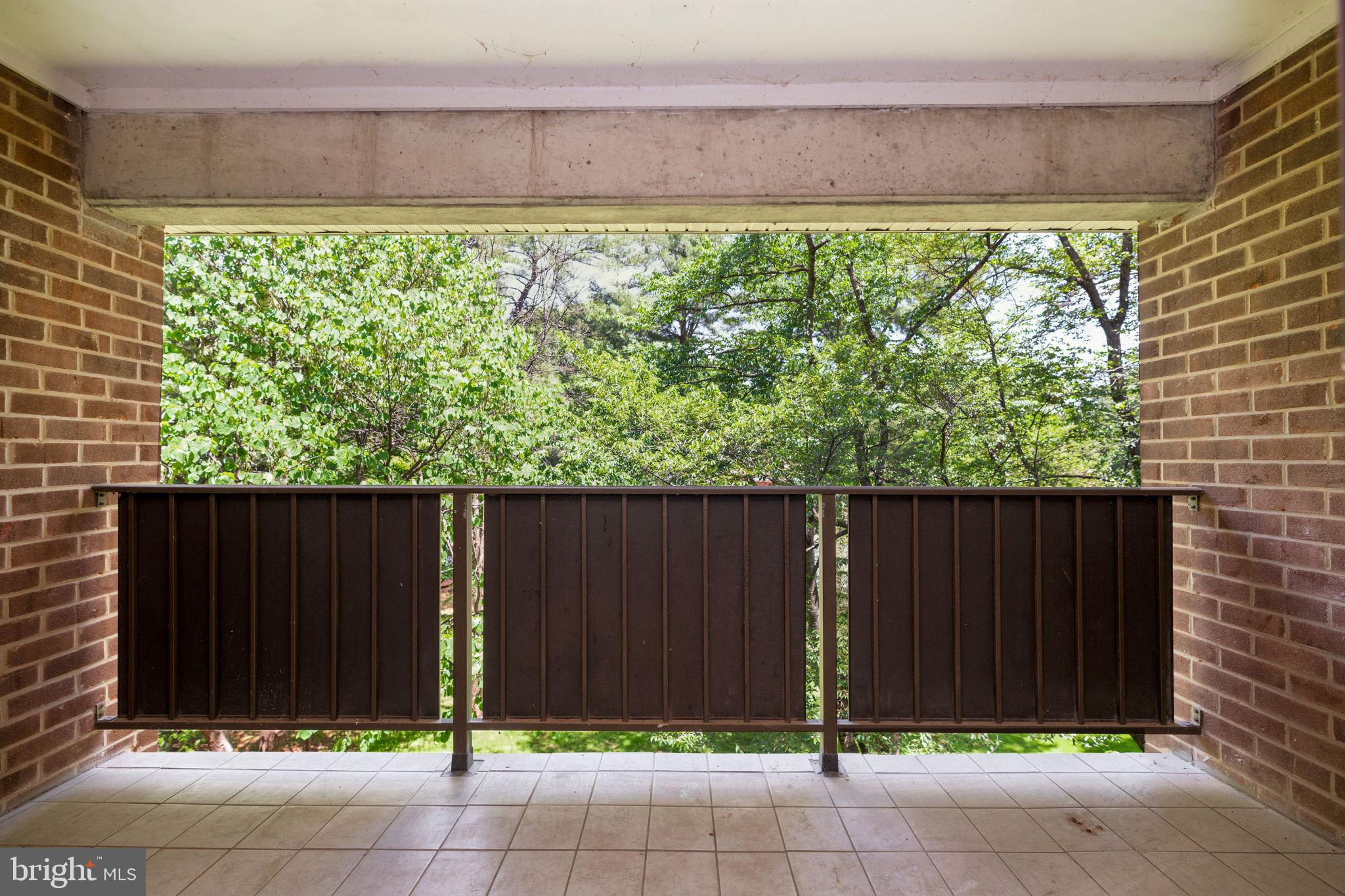 1443 Northgate Square, Unit 22B Reston, VA 20190 - Photo 26 of 42 a view of a backyard