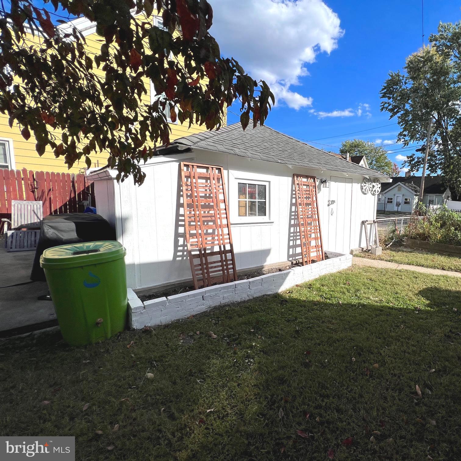 313 Middleton Street Riverside, NJ 08075 - Photo 29 of 35 rear year view of garage & raised garden beds