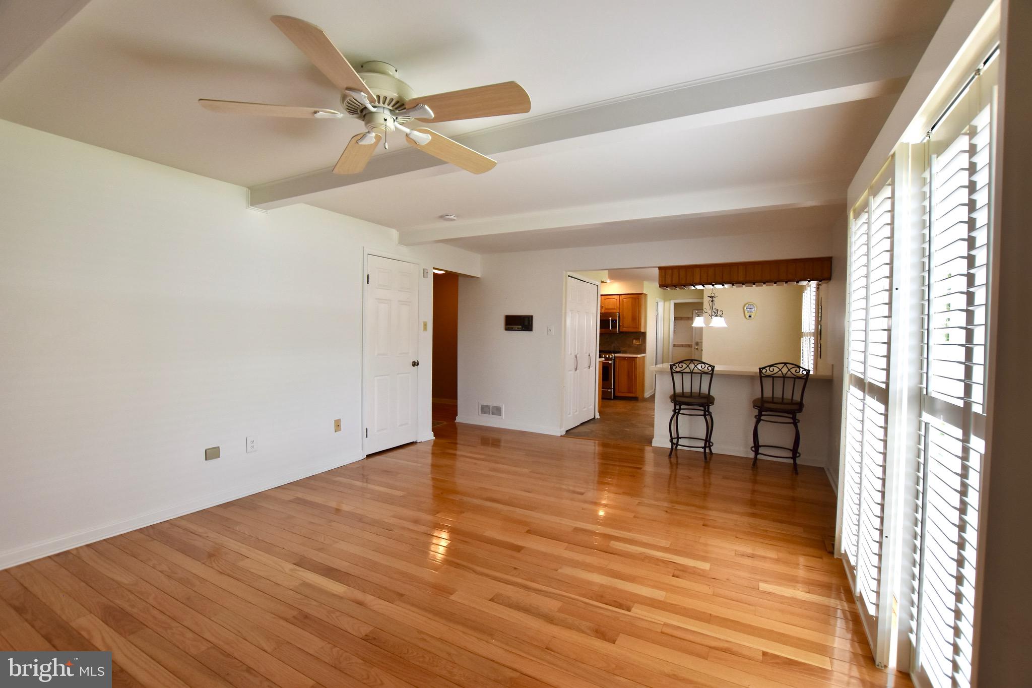 44 West Brookline Drive Laurel Springs, NJ 08021 - Photo 14 of 39 wooden floor in an empty room with a window
