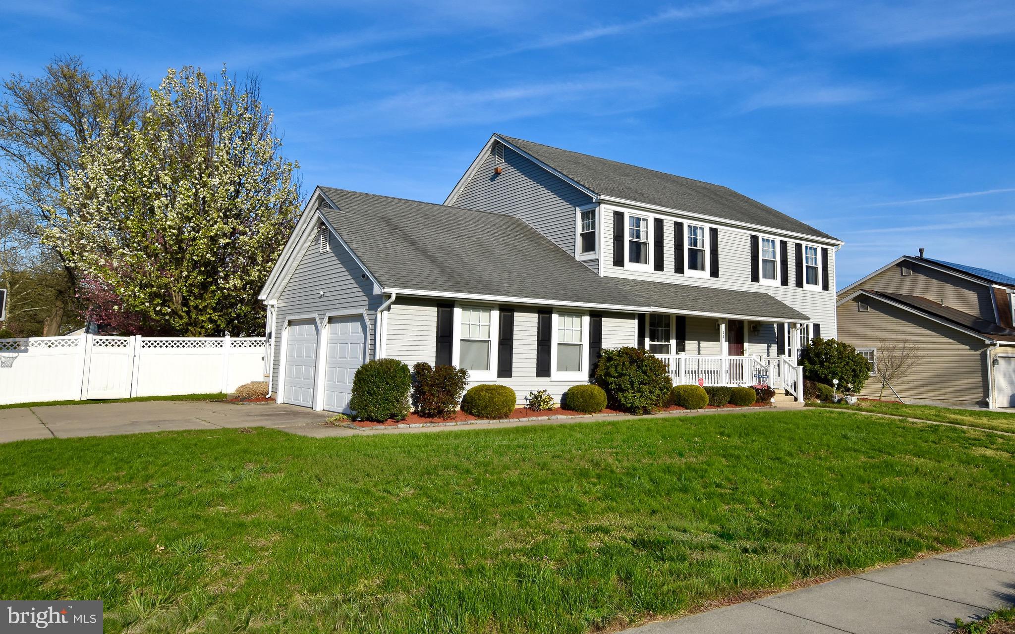 44 West Brookline Drive Laurel Springs, NJ 08021 - Photo 2 of 39 a front view of a house with a yard and trees
