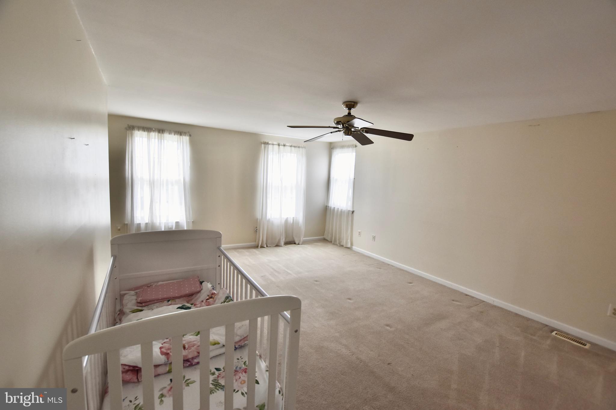 44 West Brookline Drive Laurel Springs, NJ 08021 - Photo 21 of 39 a view of an empty room with windows