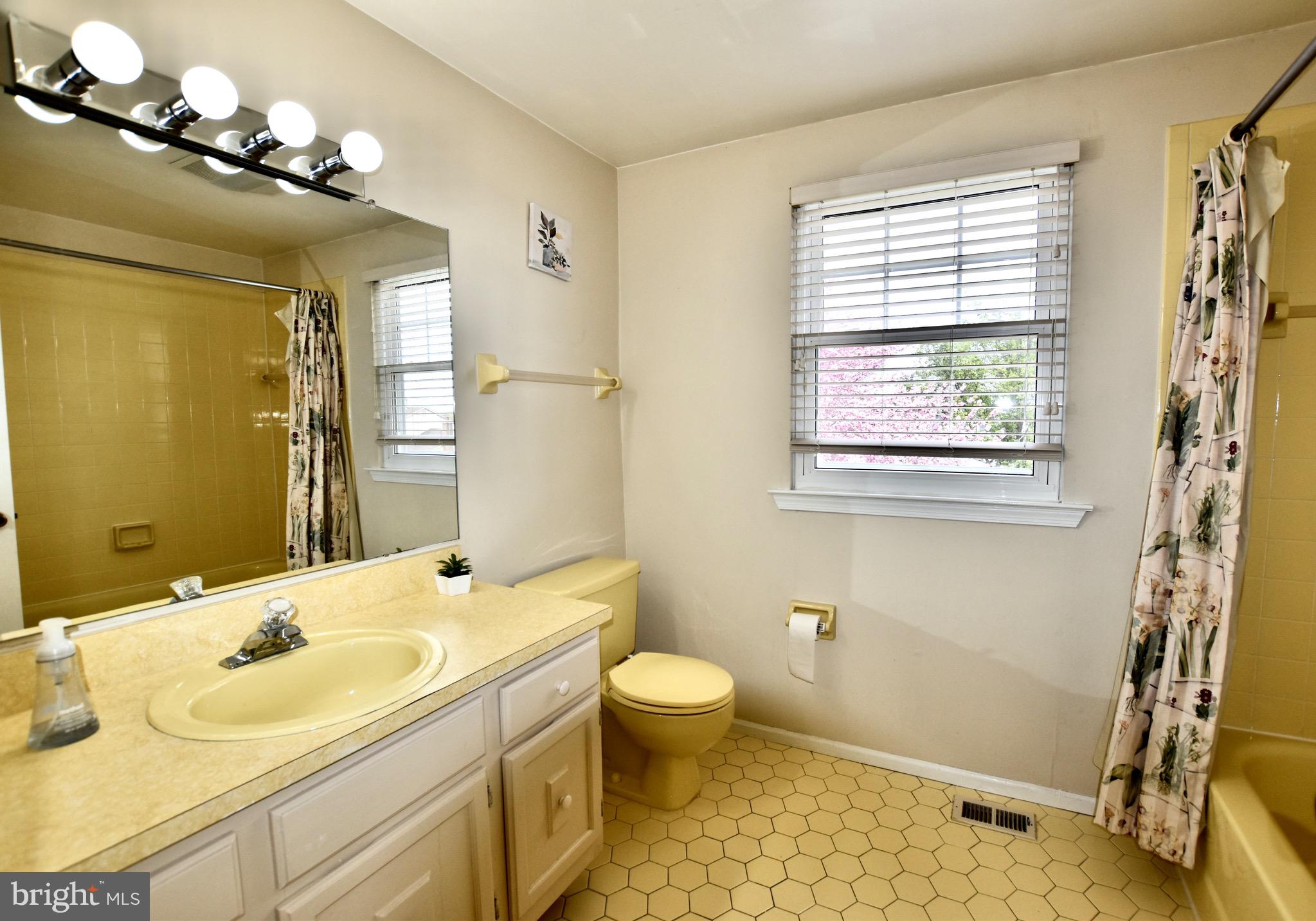 44 West Brookline Drive Laurel Springs, NJ 08021 - Photo 24 of 39 a bathroom with a sink a toilet and a mirror