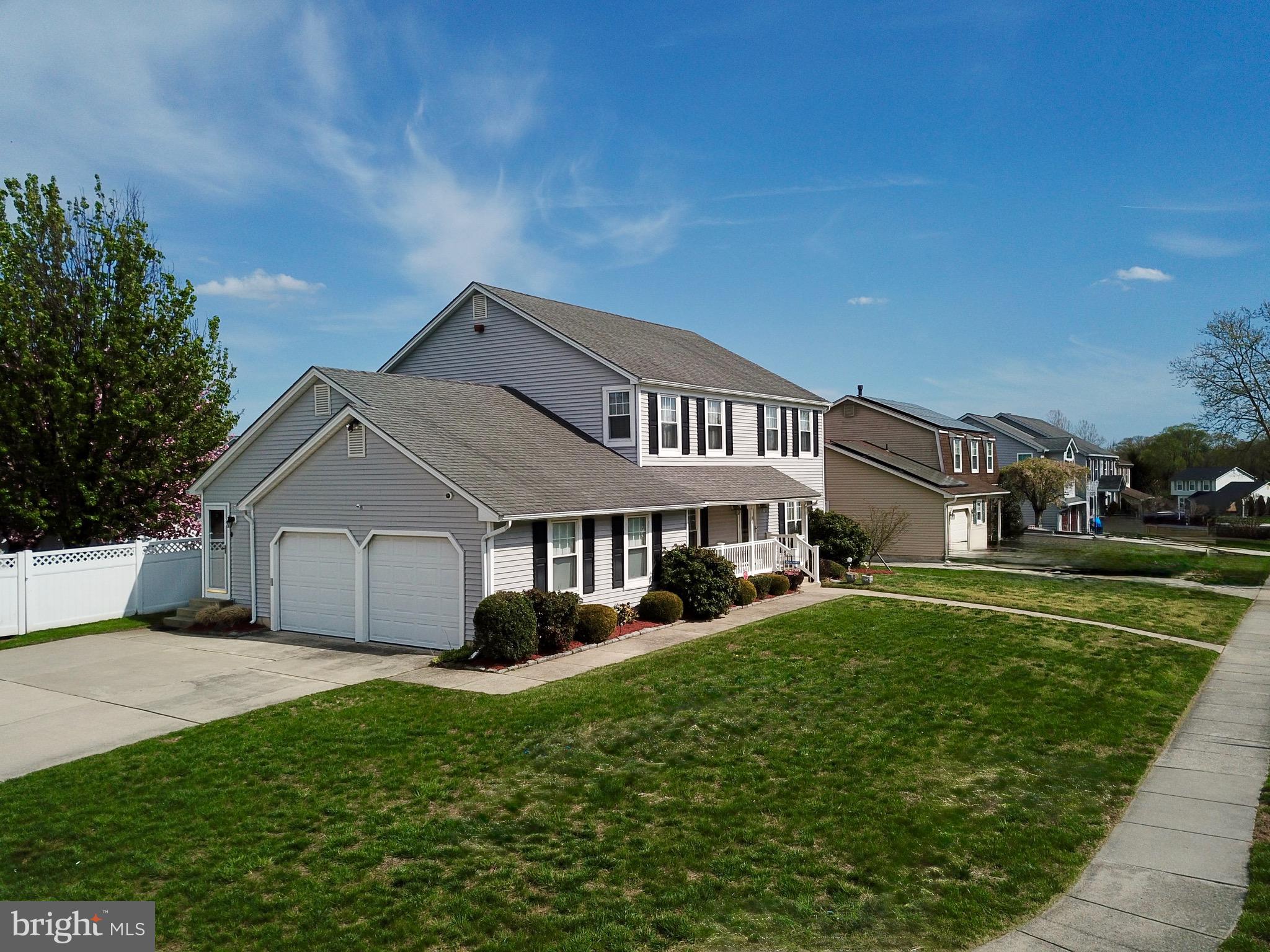44 West Brookline Drive Laurel Springs, NJ 08021 - Photo 3 of 39 a front view of a house with a yard