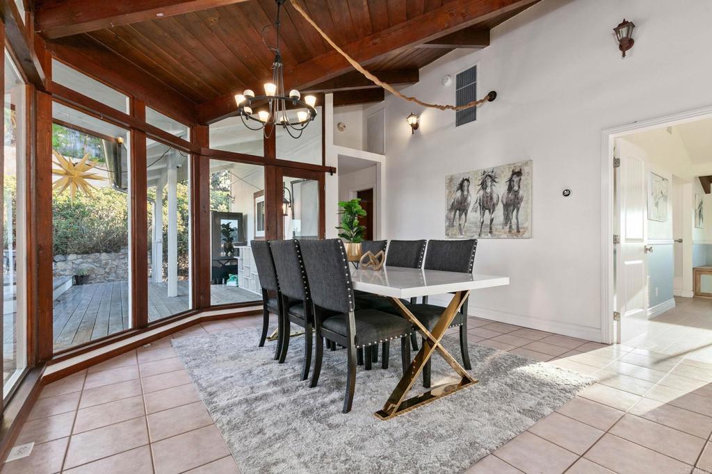 1628 Lone Oak Road Vista, CA 92084 - Photo 12 of 39 a dining room with furniture and window