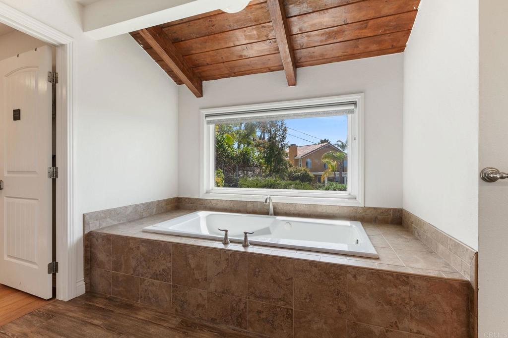 1628 Lone Oak Road Vista, CA 92084 - Photo 22 of 39 a view of a bathtub in a room