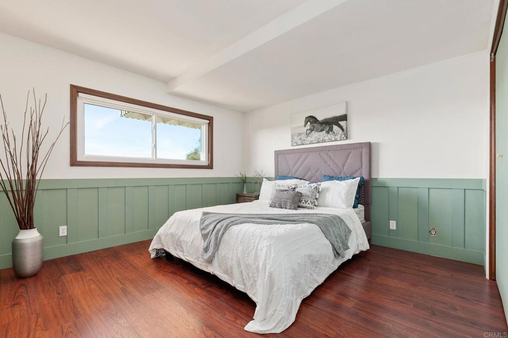 1628 Lone Oak Road Vista, CA 92084 - Photo 24 of 39 a bedroom with a bed and a window
