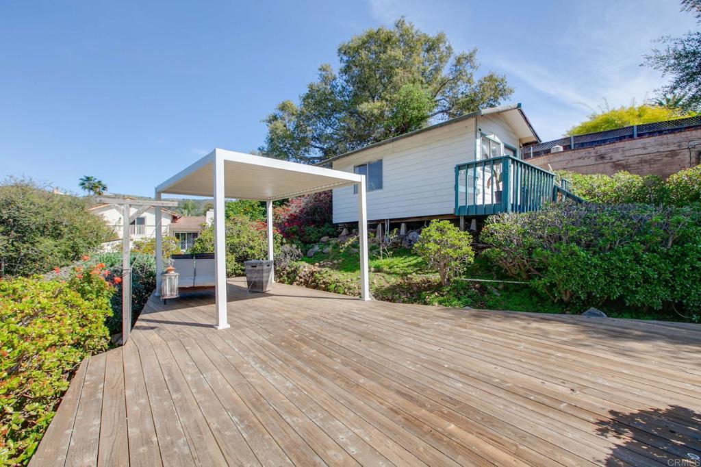 1628 Lone Oak Road Vista, CA 92084 - Photo 35 of 39 a view of a house with porch and garden