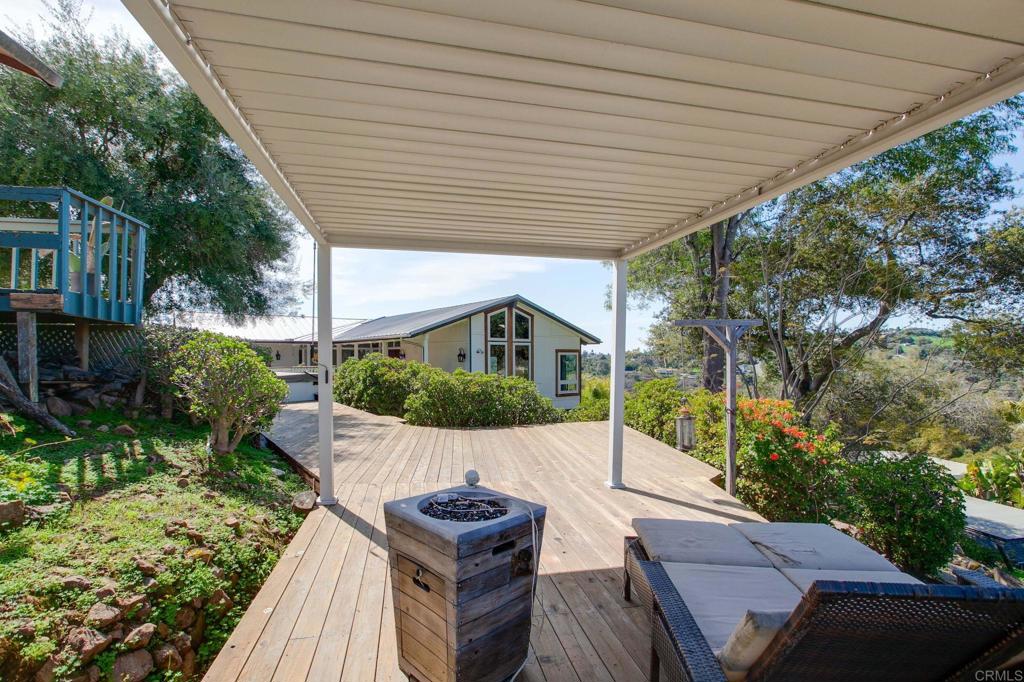 1628 Lone Oak Road Vista, CA 92084 - Photo 36 of 39 a front view of a house with garden