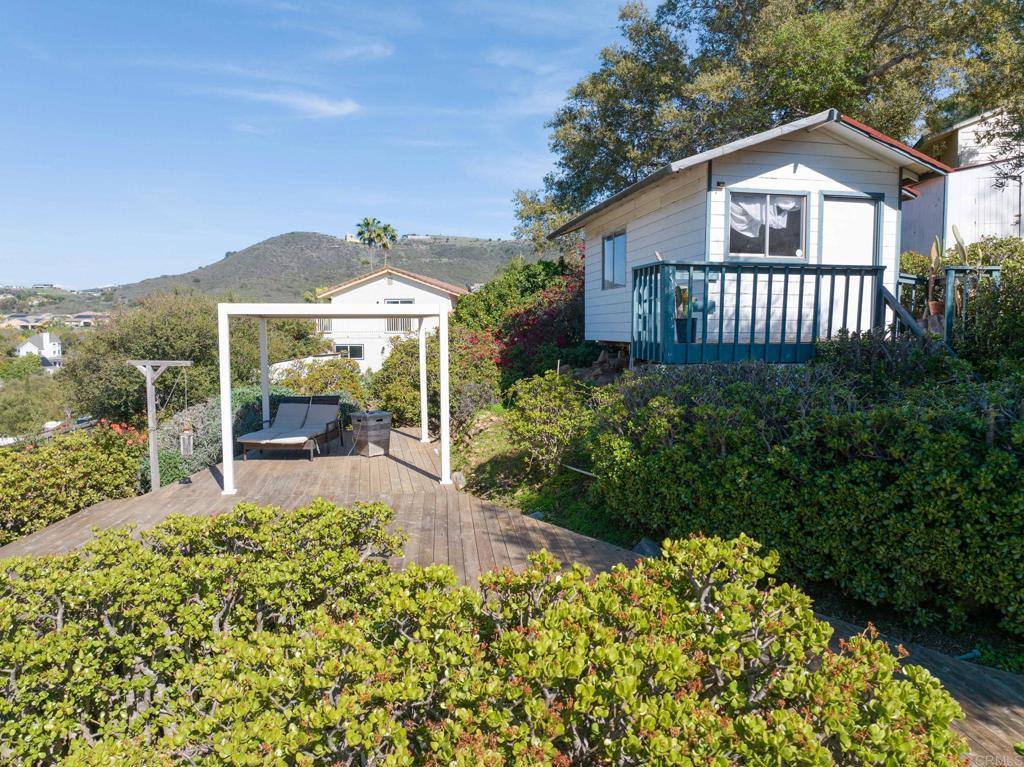 1628 Lone Oak Road Vista, CA 92084 - Photo 39 of 39 a front view of a house with a yard