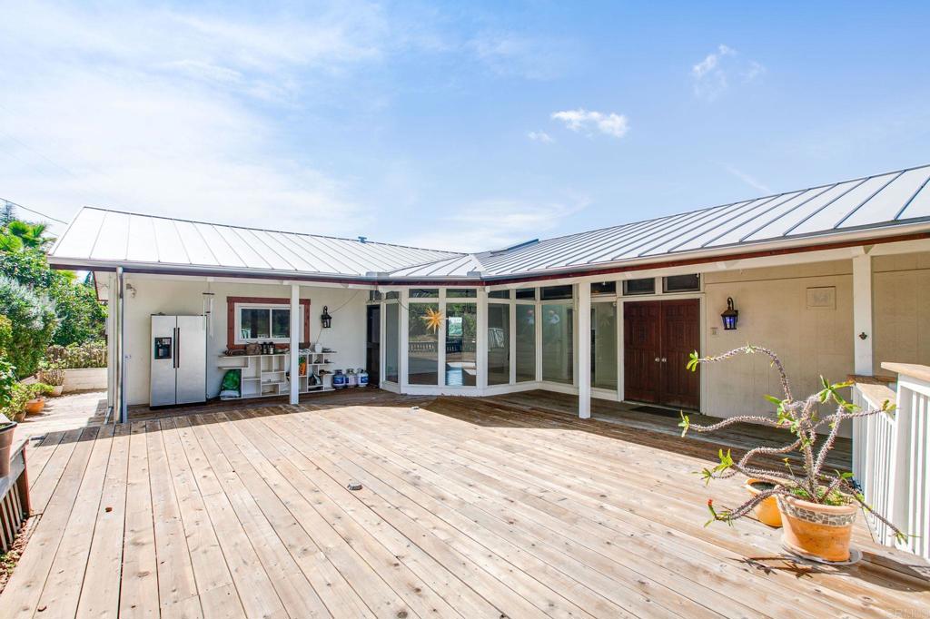 1628 Lone Oak Road Vista, CA 92084 - Photo 7 of 39 a view of a house with sitting area and glass door