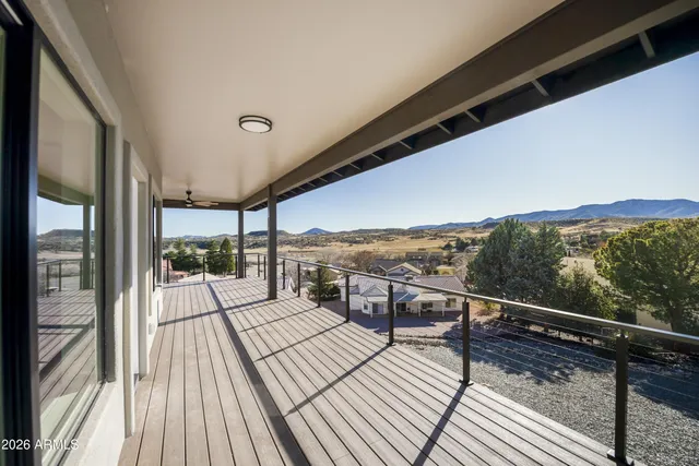 a view of a golf course with a lake view