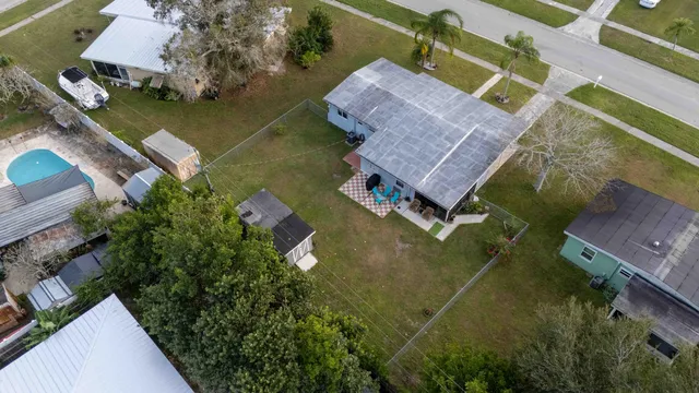an aerial view of a house with a garden