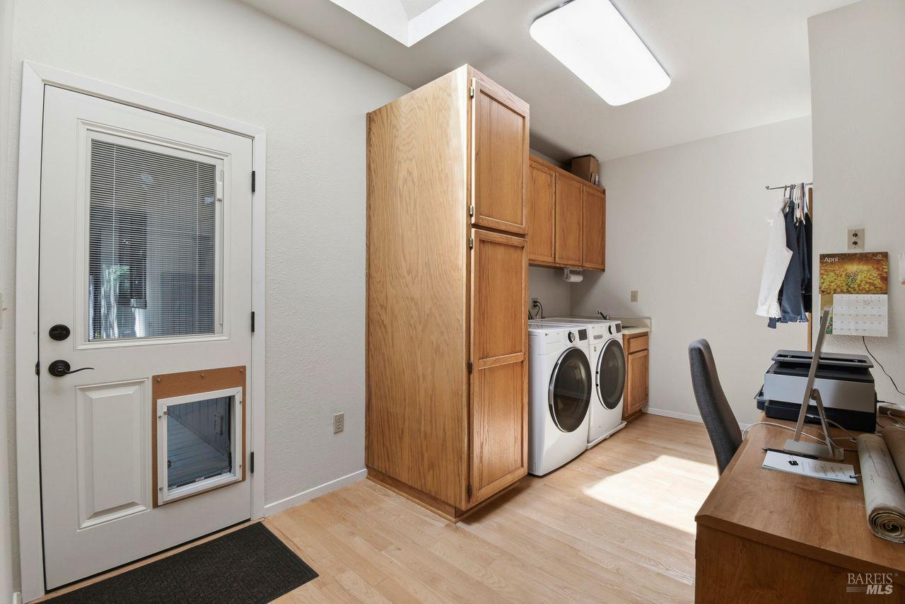 140 Massimo Circle Santa Rosa, CA 95404 - Photo 17 of 41 a view of a storage and utility room with washer and dryer