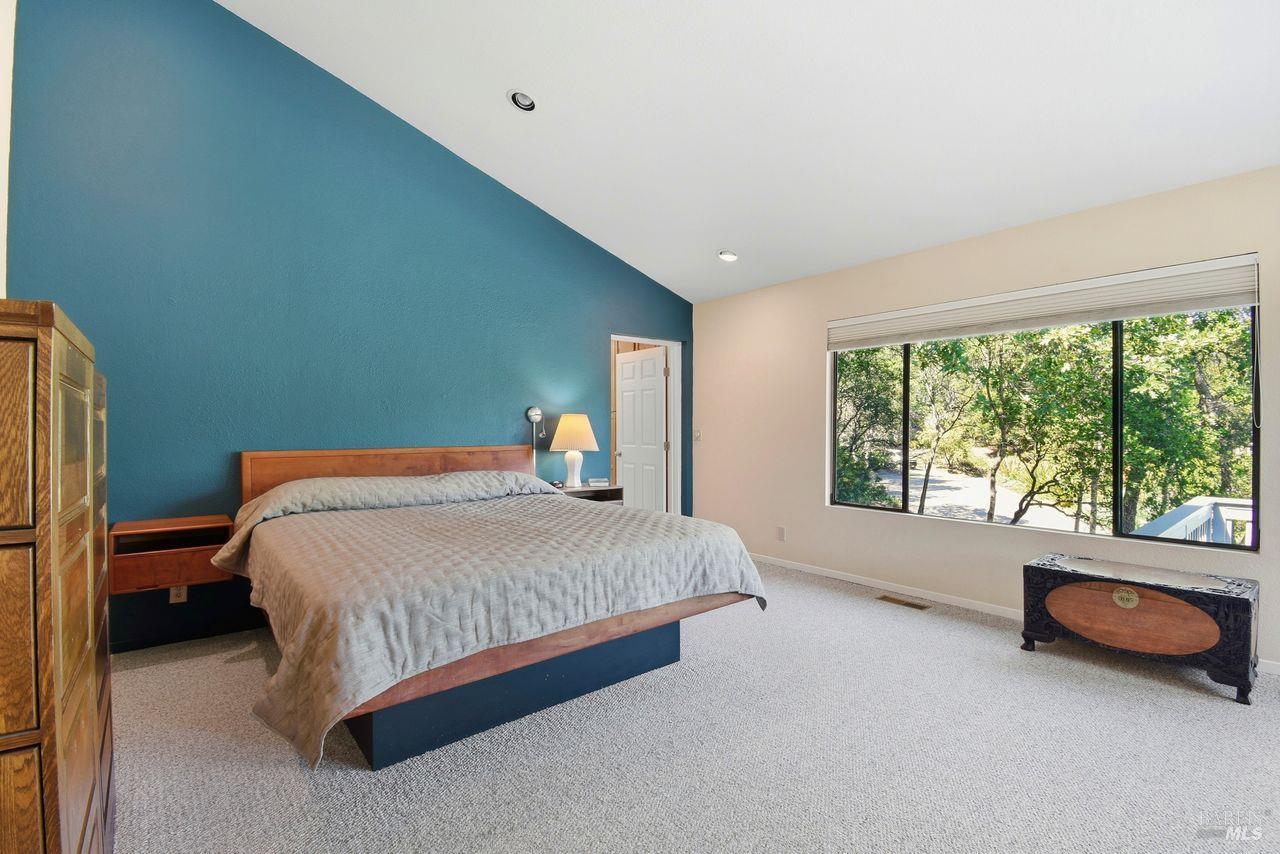 140 Massimo Circle Santa Rosa, CA 95404 - Photo 19 of 41 a bed sitting in a room next to a window