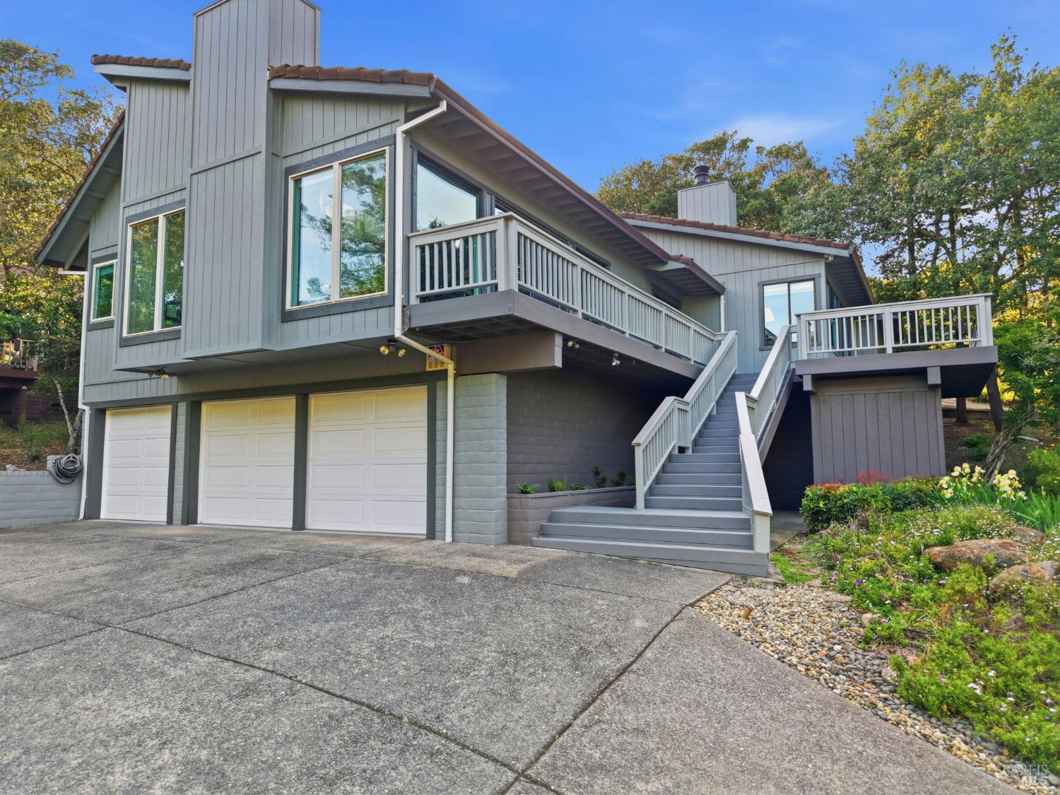 140 Massimo Circle Santa Rosa, CA 95404 - Photo 2 of 41 a front view of a house with a garage