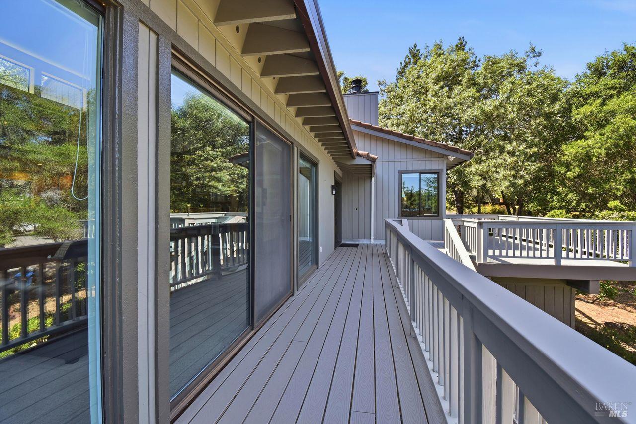 140 Massimo Circle Santa Rosa, CA 95404 - Photo 7 of 41 a view of a balcony with wooden floor and fence and a porch