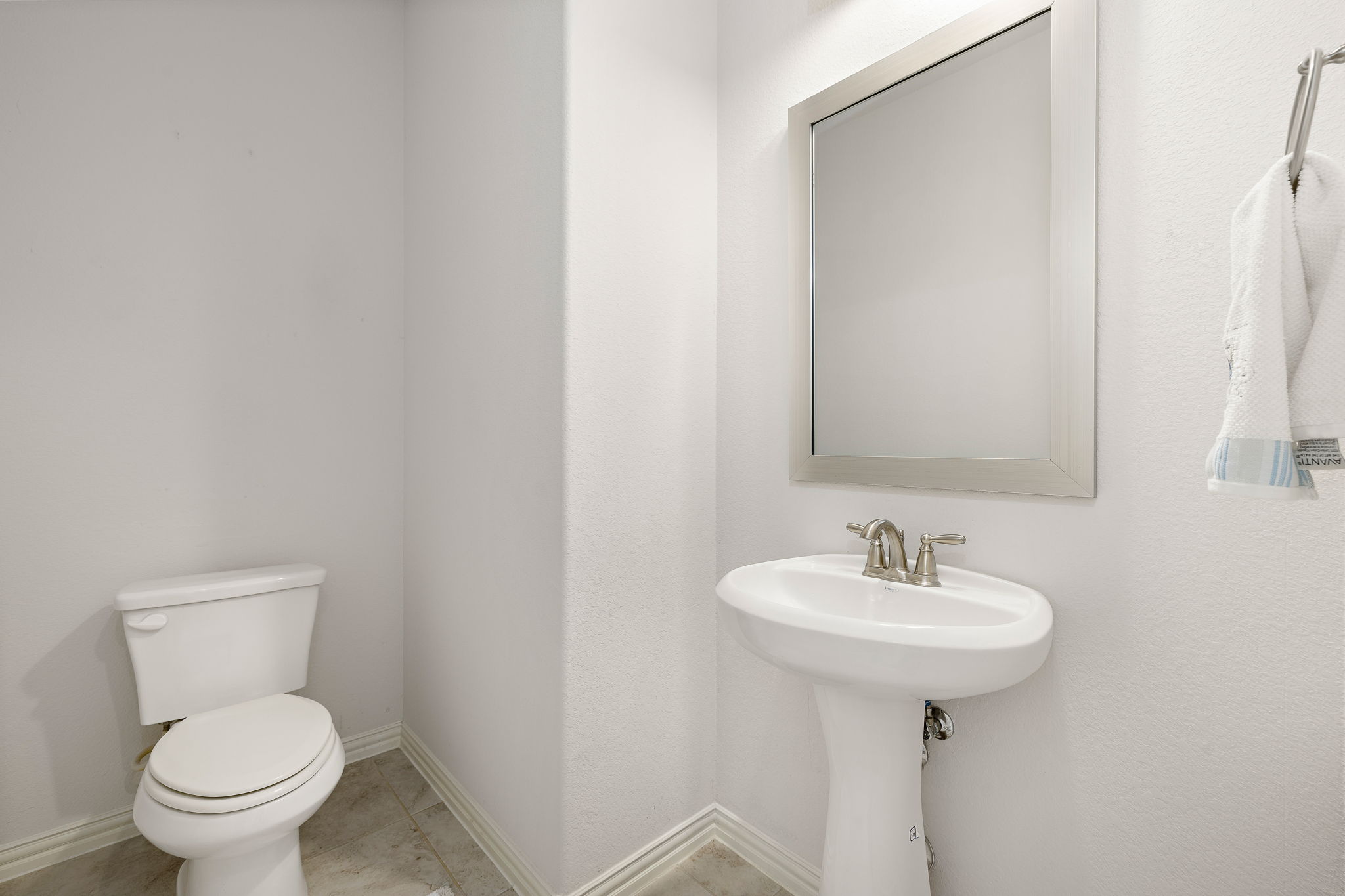 4201 Vespa Cove Leander, TX 78641 - Photo 14 of 29 a bathroom with a sink toilet and a mirror