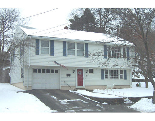 22 Station Road Salem, MA 01970 - Photo 1 of 4 a front view of a house with a yard