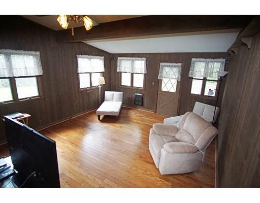 74 Oregon Street Springfield, MA 01118 - Photo 15 of 21 a living room with furniture and a large window