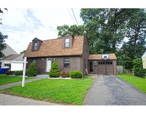 74 Oregon Street Springfield, MA 01118 - Photo 2 of 21 a front view of a house with garden