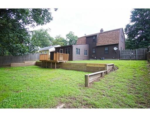 74 Oregon Street Springfield, MA 01118 - Photo 21 of 21 a swimming pool with outdoor seating and yard