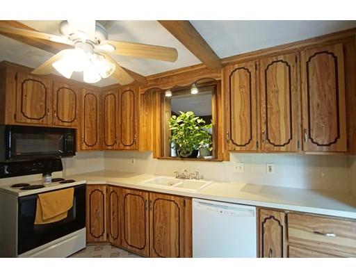74 Oregon Street Springfield, MA 01118 - Photo 6 of 21 a bathroom with a sink a mirror and cabinets