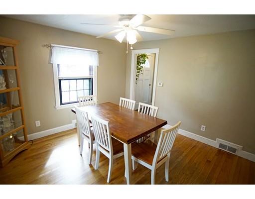 74 Oregon Street Springfield, MA 01118 - Photo 8 of 21 a view of a dining room with furniture and a chandelier