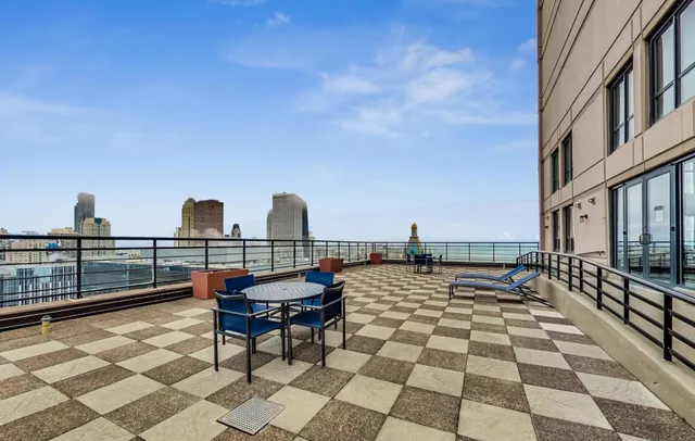 a view of a terrace with chairs