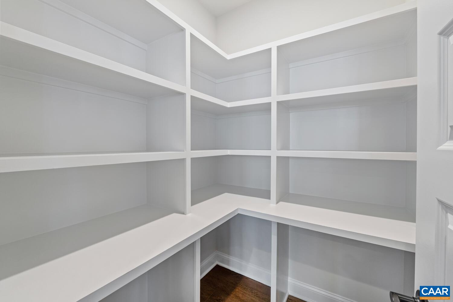 1731 Fowler Street Charlottesville, VA 22901 - Photo 23 of 54 a storage room with empty racks