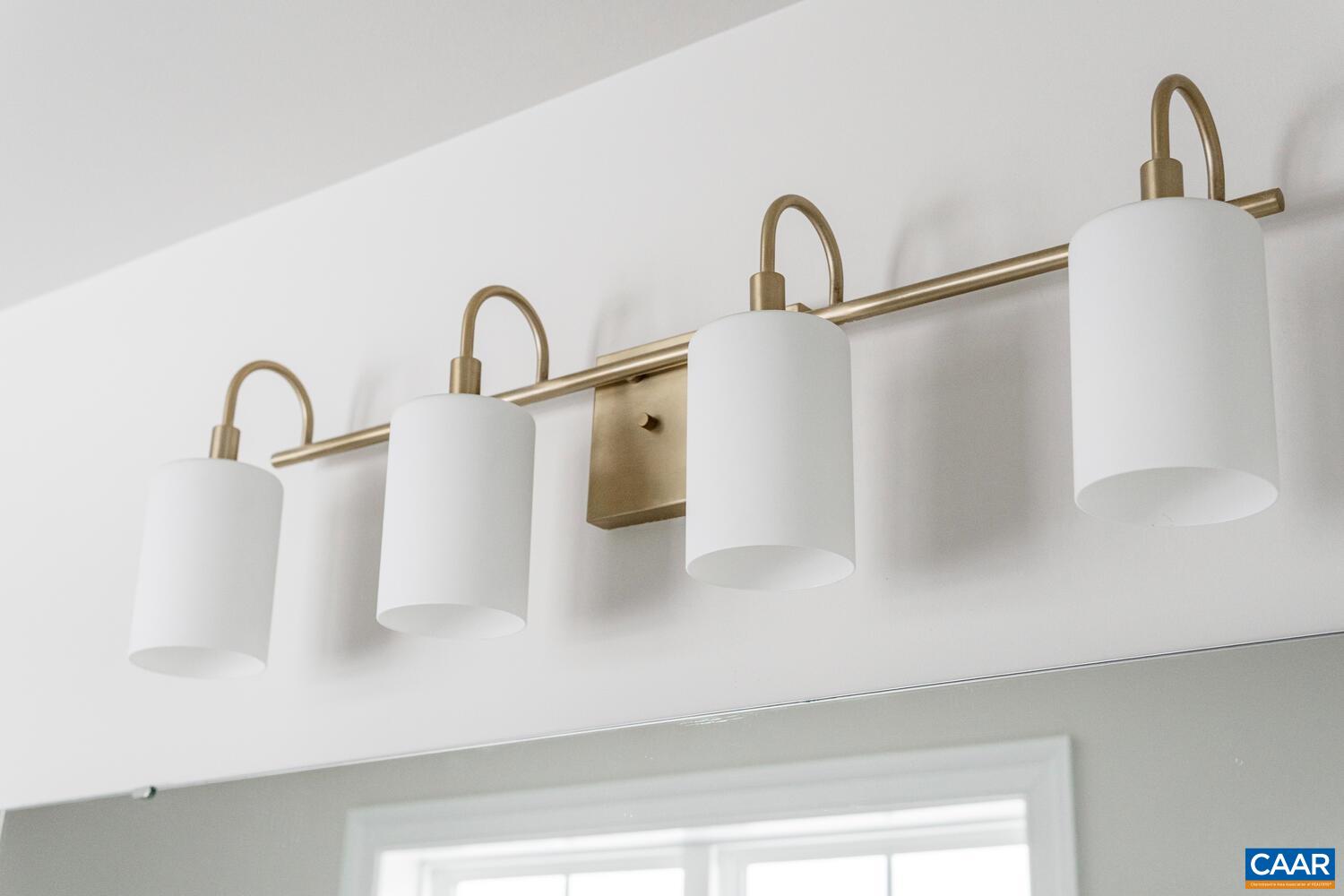 1731 Fowler Street Charlottesville, VA 22901 - Photo 27 of 54 a close view of a faucet a sink and a window