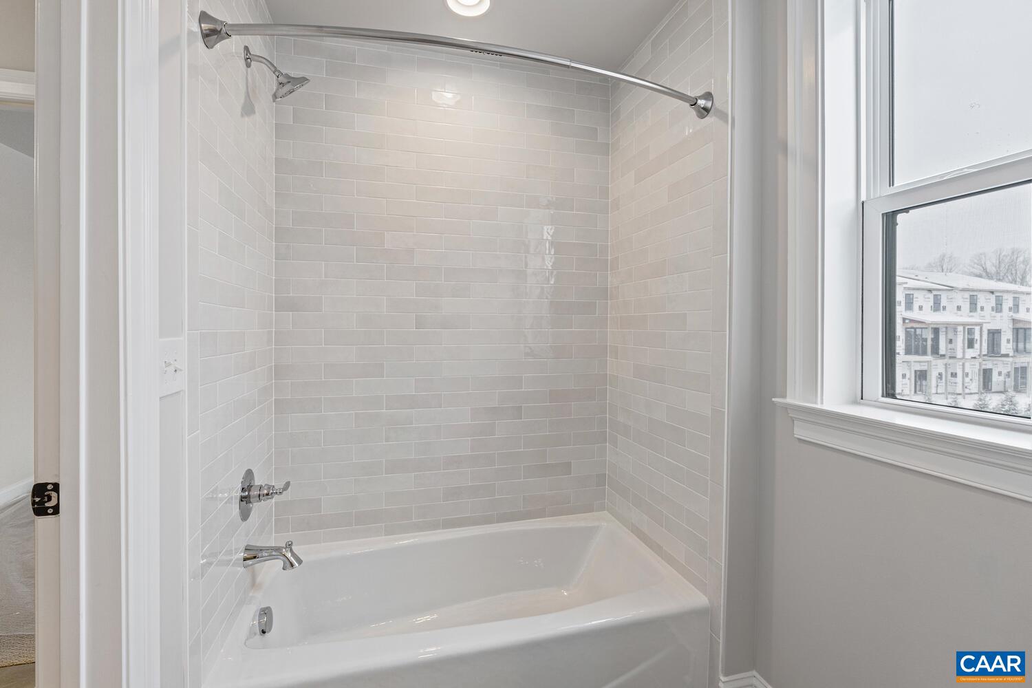 1731 Fowler Street Charlottesville, VA 22901 - Photo 41 of 54 a bathroom with a shower and a bath tub