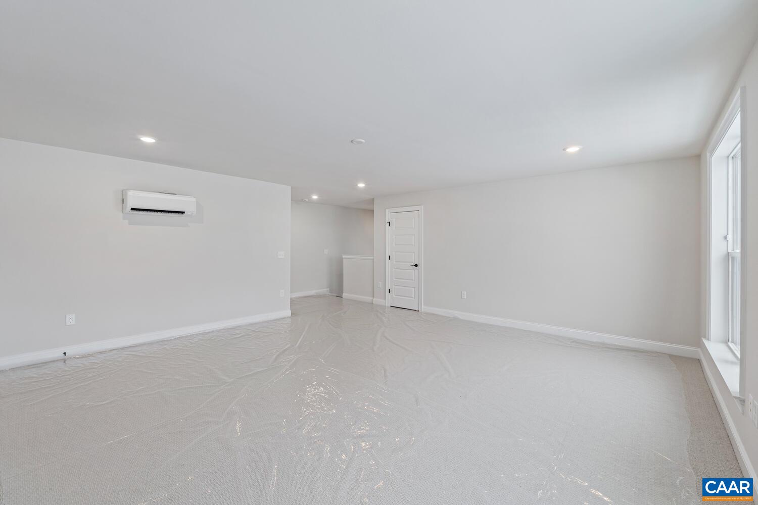 1731 Fowler Street Charlottesville, VA 22901 - Photo 46 of 54 an empty room with an entryway