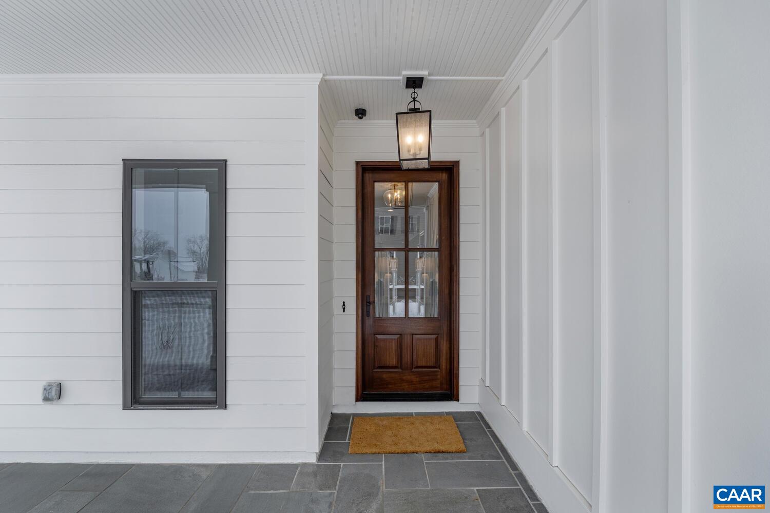 1731 Fowler Street Charlottesville, VA 22901 - Photo 5 of 54 a view of a hallway with wooden floor and a livingroom view