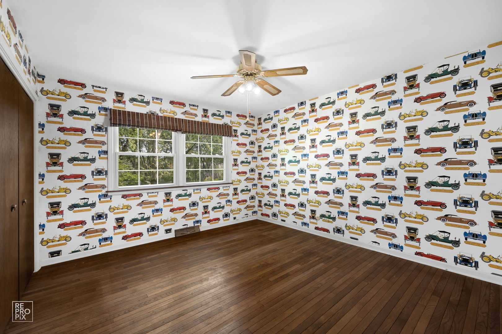 615 Harding Road Hinsdale, IL 60521 - Photo 23 of 32 a view of wooden floor and chandelier in a room