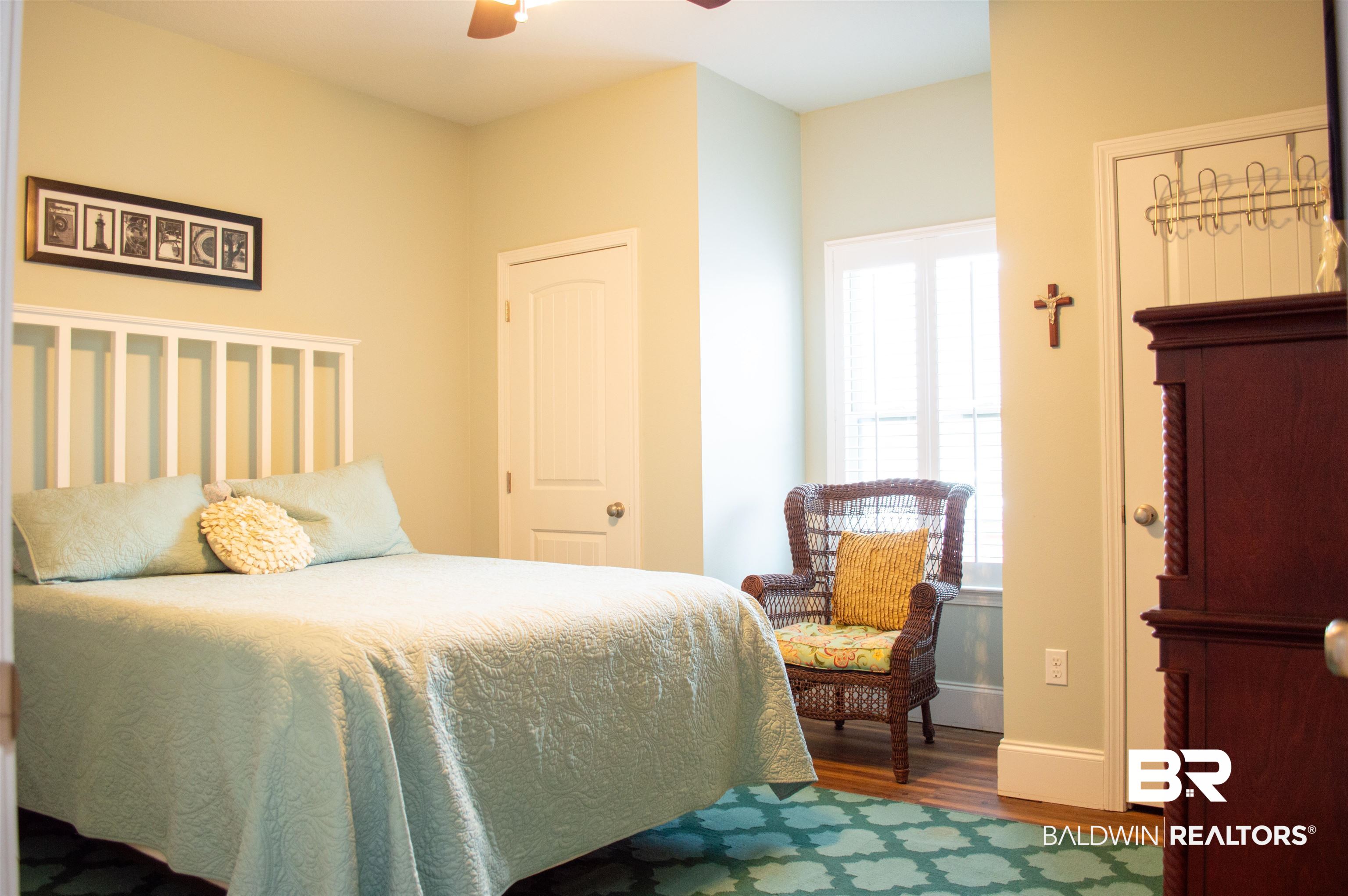 1124 West Orlando Drive Foley, AL 36535 - Photo 31 of 51 Bedroom featuring wood finished floors and ceiling fan